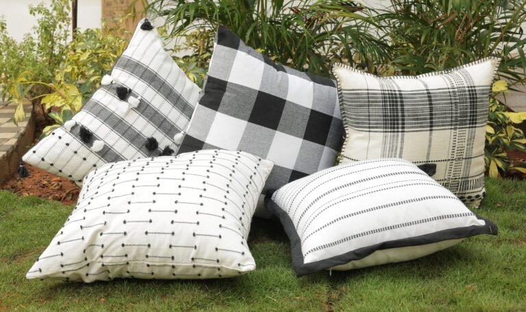 Colorful cushion produced by cushion cover manufacturers in India, showcasing detailed patchwork and craftsmanship