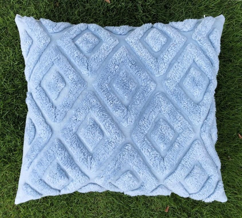 Luxurious fur pillow created by fur pillow manufacturers, adding a touch of elegance to any space