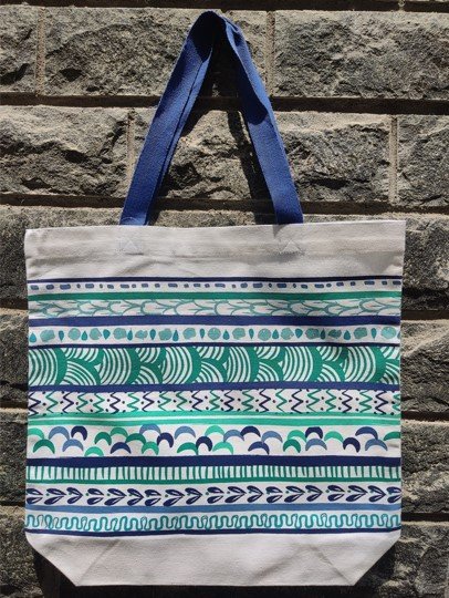 A high-quality woven cotton tote bag made by cotton tote bag manufacturers.