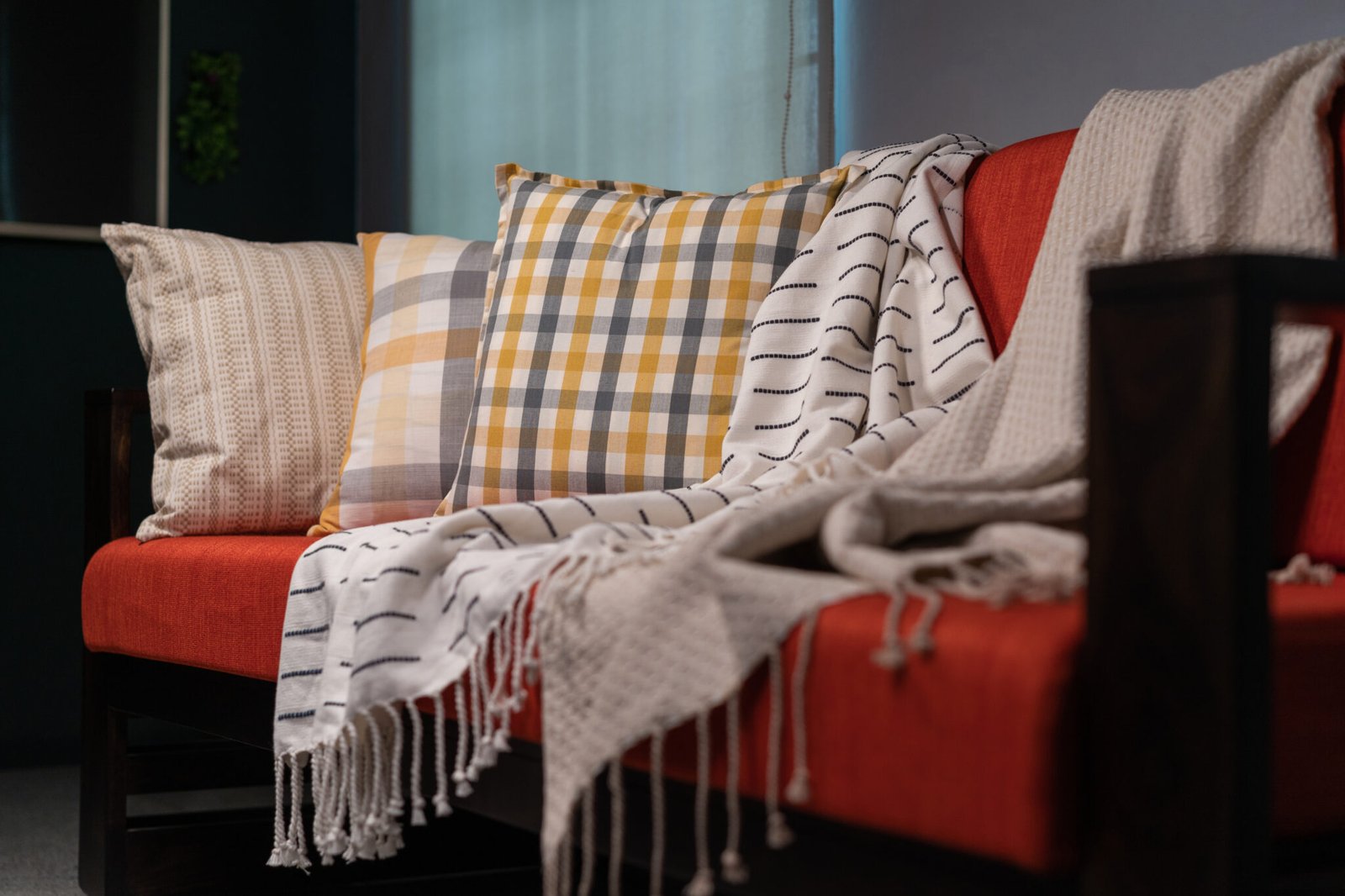 A variety of throws in different colors and patterns, showcasing the craftsmanship of throw manufacturers