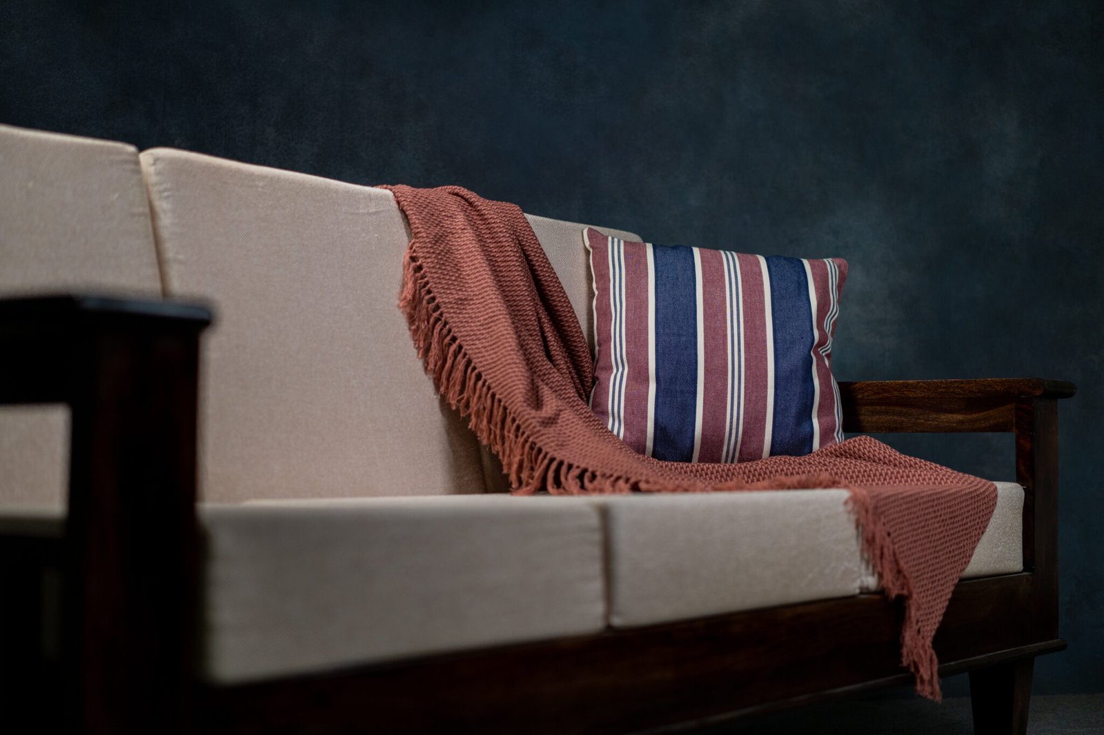Detailed, hand-knitted throws in multiple patterns and colors, crafted by knitted throw manufacturers
