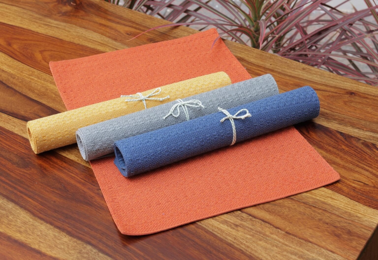 Durable and stylish table mats produced by top table mat manufacturers, available in various colors and patterns